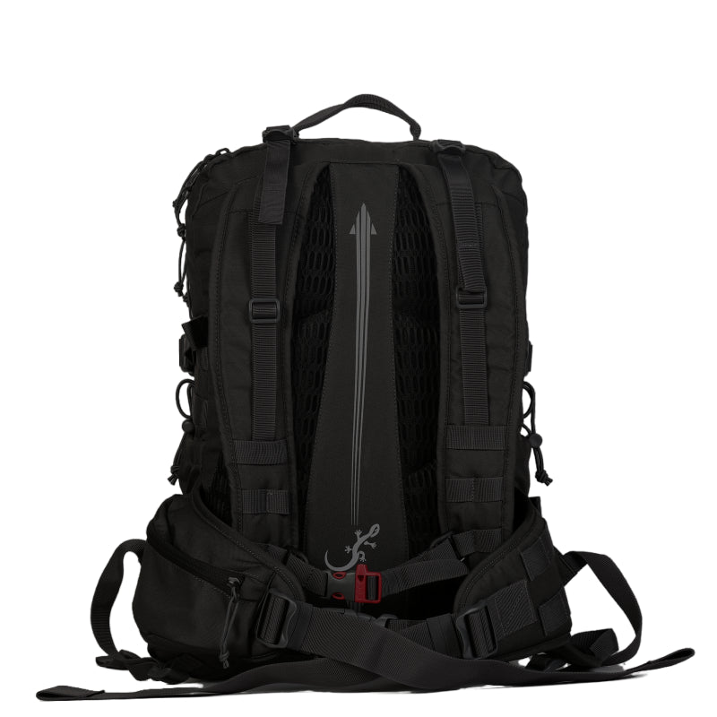 Sac d'évacuation Mangouste 32 litres - vue de dos- ceinture avec système MOLLE d'un côté et poche zippée de l'autre, sangle poitrine avec sifflet d'urgence