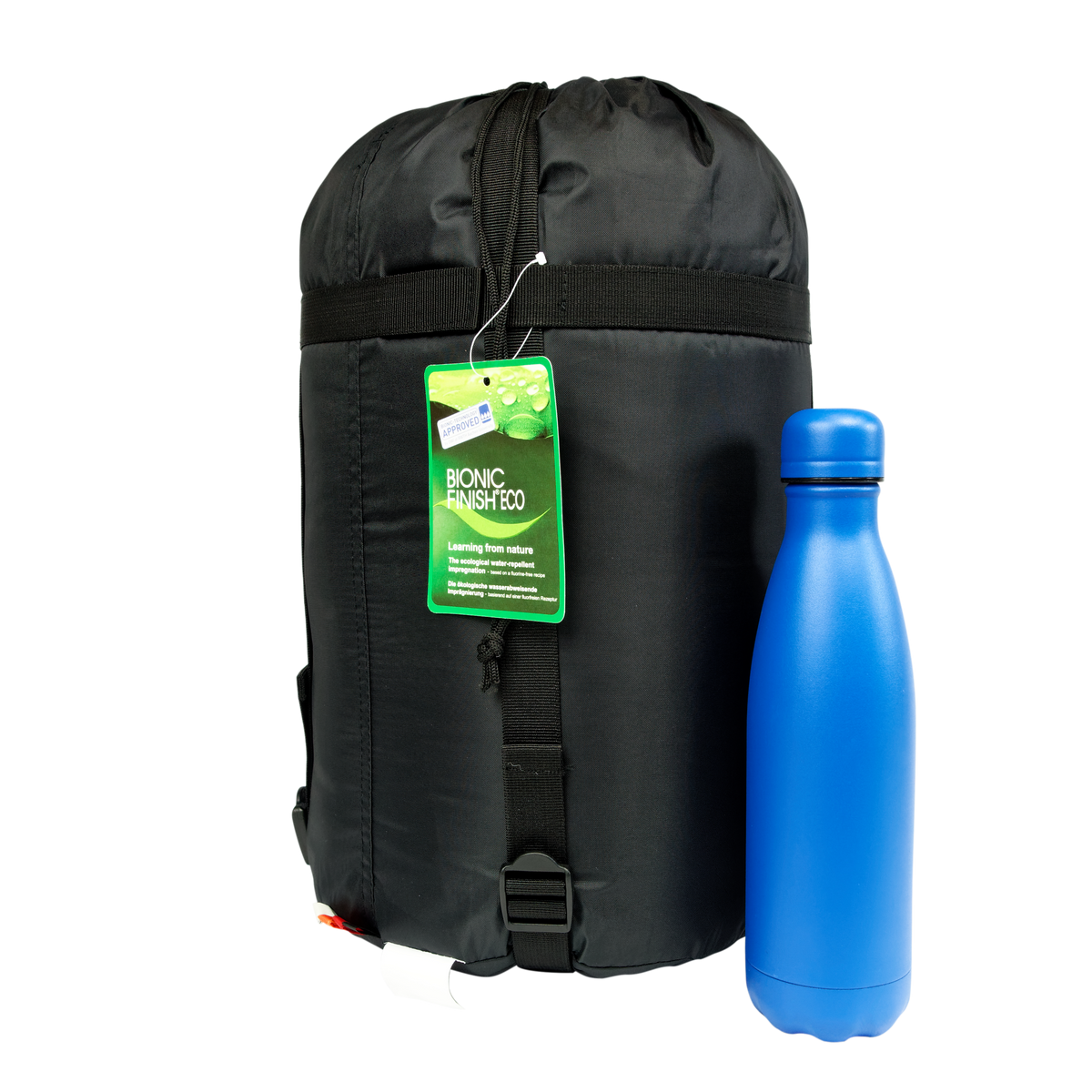 Sac de couchage d'hiver King 300, marque Freetime, dans son sac de rangement avec une gourde de 800ml pour comparaison.