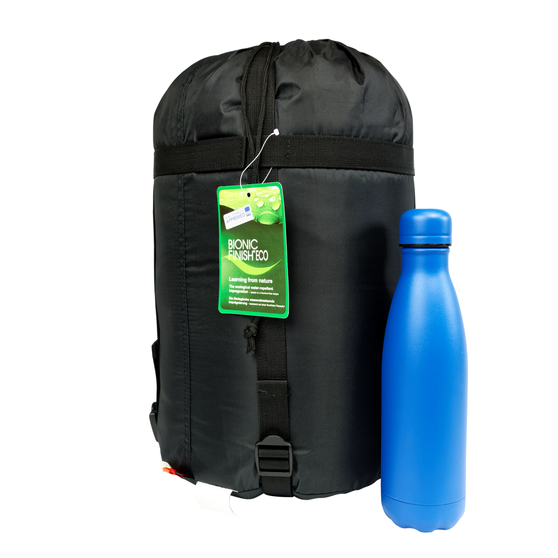 Sac de couchage d'hiver King 300, marque Freetime, dans son sac de rangement avec une gourde de 800ml pour comparaison.